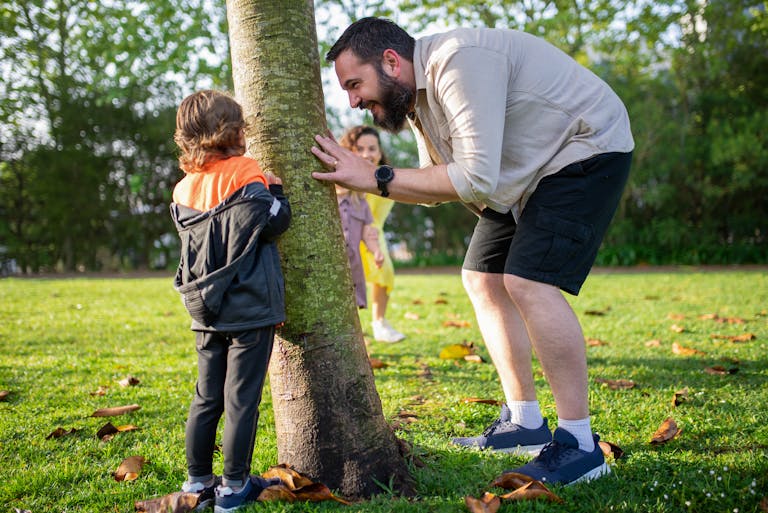 Bearded Man Hiding from a Boy