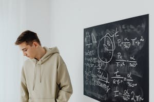 Boy in Beige Hoodie Looking Disappointed